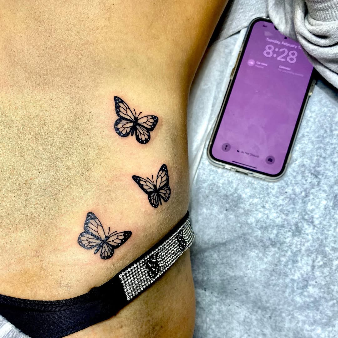 Butterfly trail tattoo