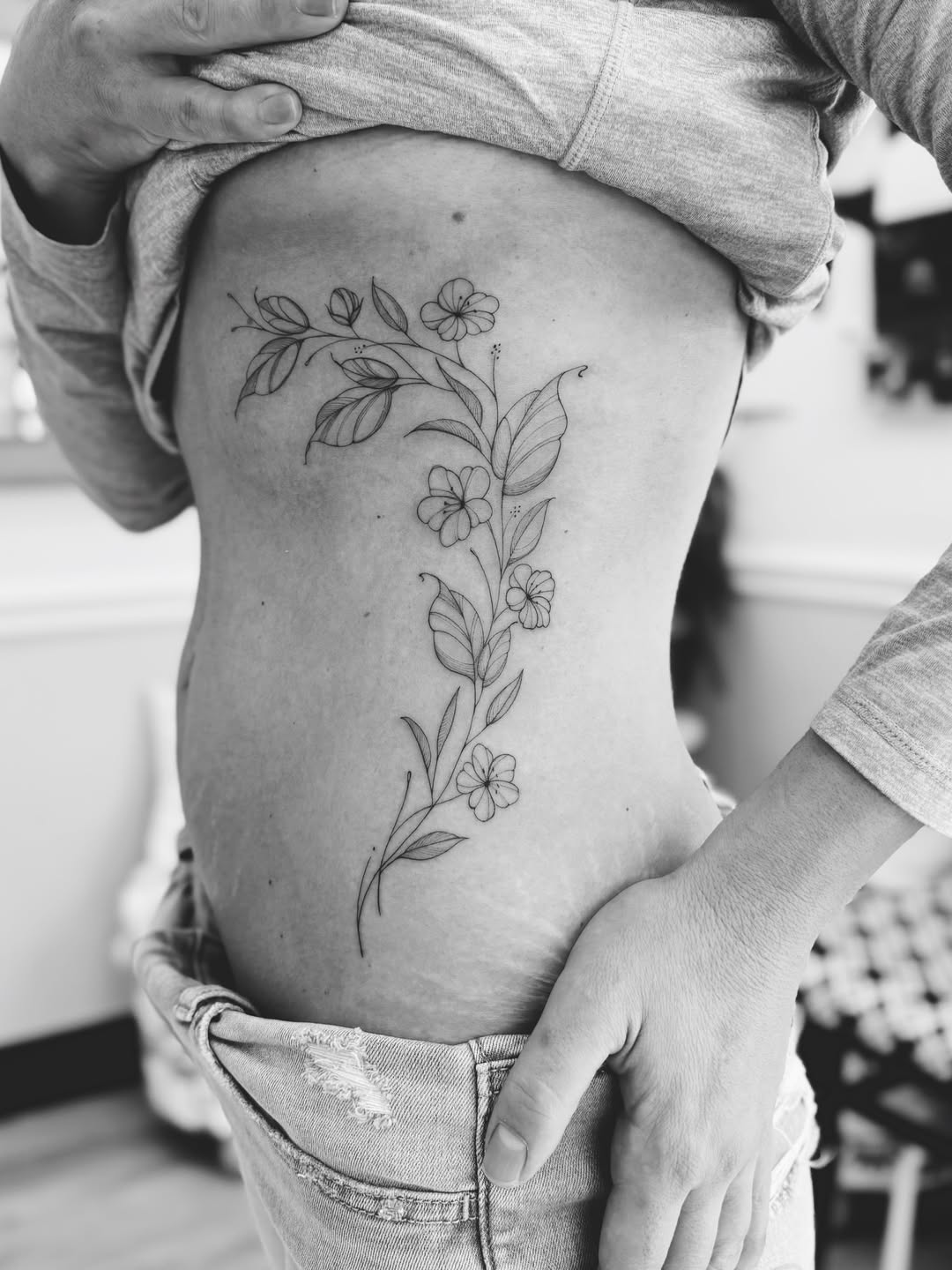 floral vine tummy tattoo